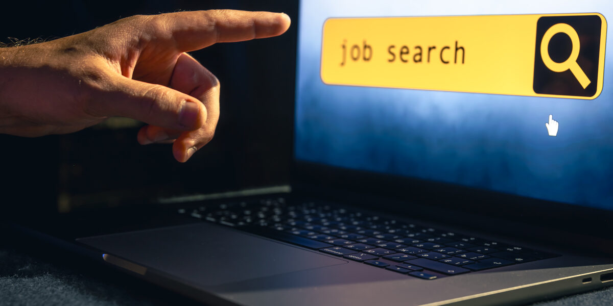 Man working on laptop and Information for the searching job, employment concept.